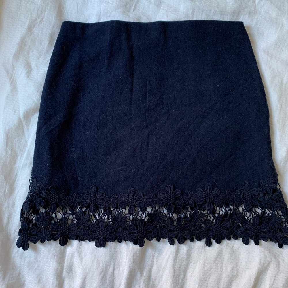 Navy Zara skirt with embroidery at the hem